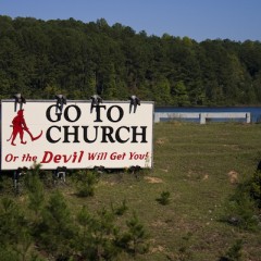 This billboard near the center of Alabama (The Bible Belt) encourages people to go to church. - Photo by The Pug Father/Wikipedia 