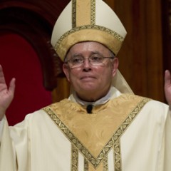 Archbishop Charles J. Chaput acknowledges applause during his Mass of installation at the Cathedral Basilica of Sts. Peter and Paul in Philadelphia on Sept. 8, 2011.